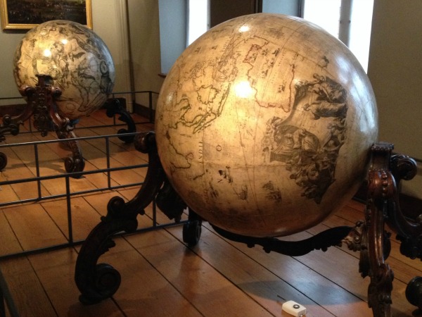 Two globes in the Musee Hospice Comtesse, Lille, France, depict two worlds – the earth and the heavens.